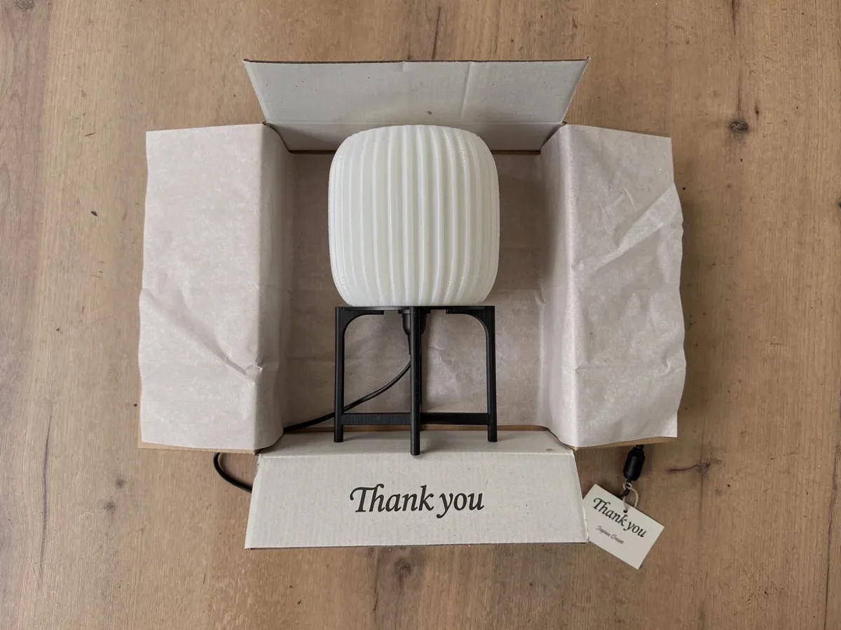LampuKita lamp in branded packaging, ready for delivery