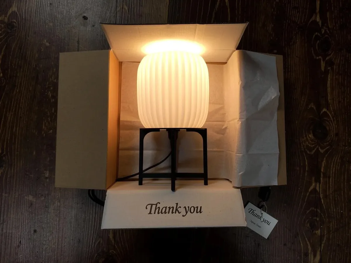 LampuKita lamp in branded packaging, ready for delivery